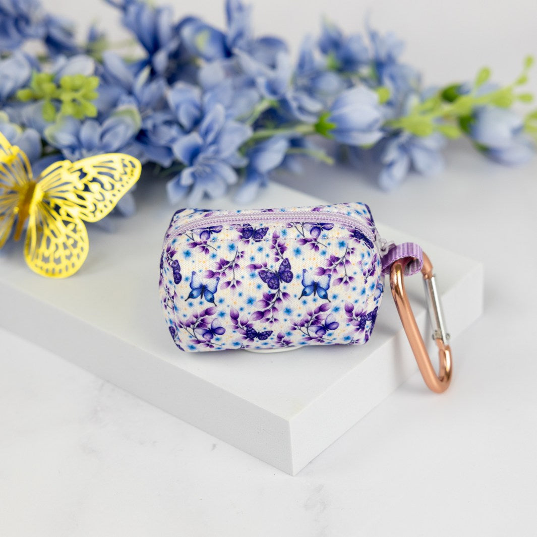 Underside of the Social Butterfly deja poo waste bag holder.