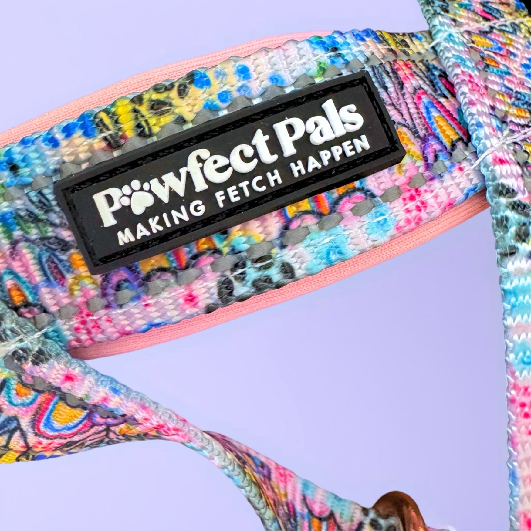 Colorful dog leash with 'Powfect Pals' branding on a light purple background