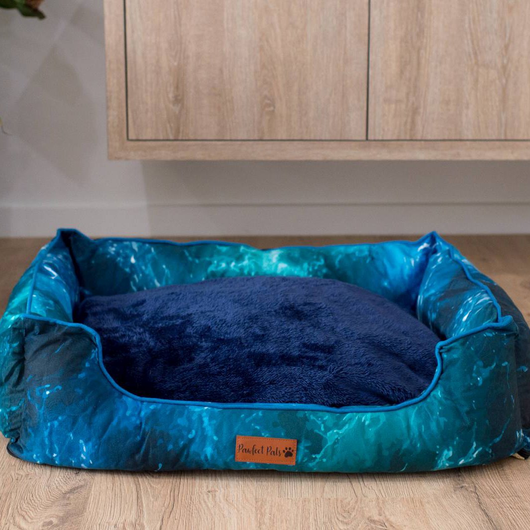 Shell Yeah snuggle bud dog bed with cushion flipped.