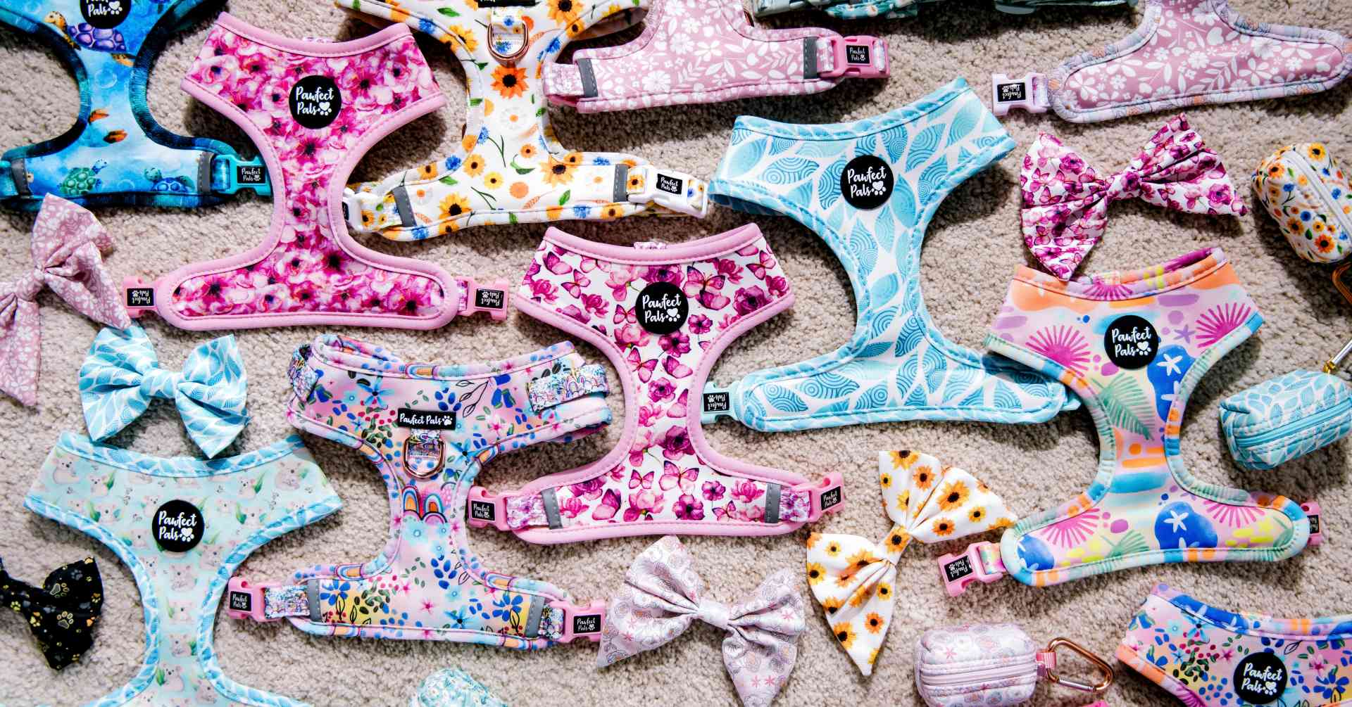 A collection of cute dog harnesses.