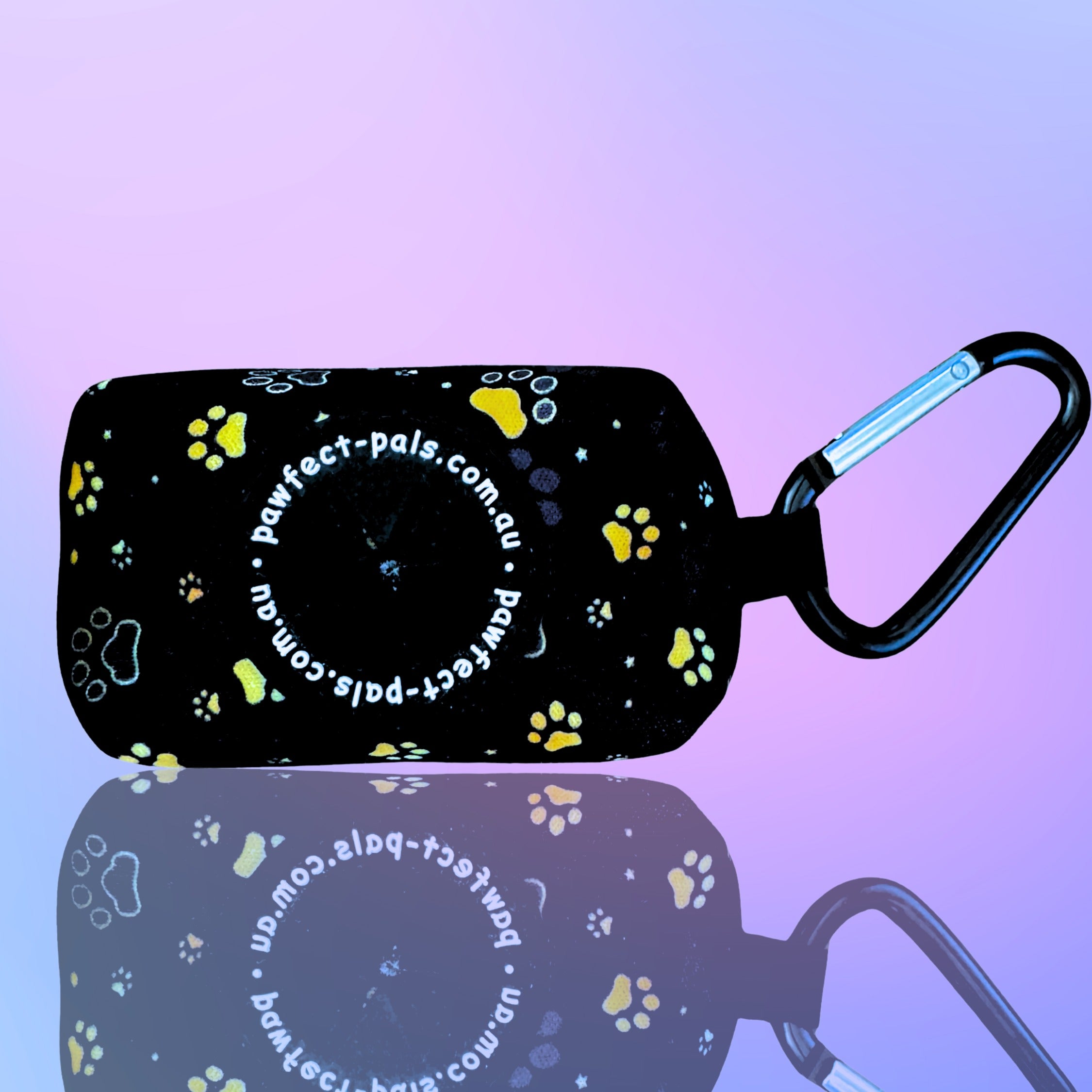 Black pouch with paw prints and carabiner on a purple gradient background