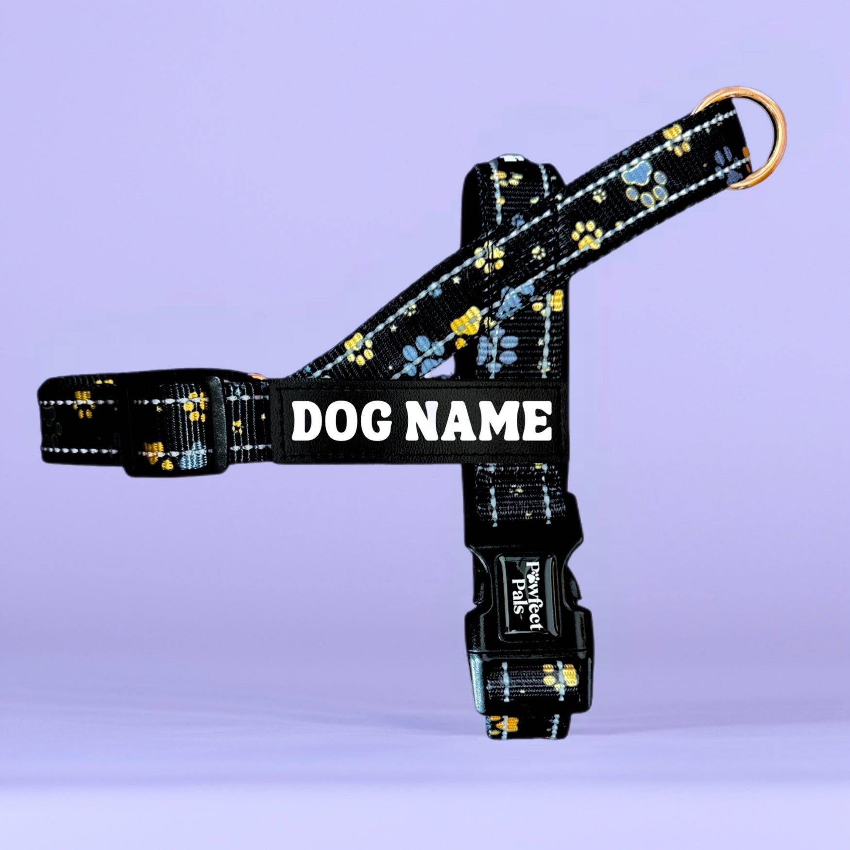 Dog harness with Paw Print pattern and customizable text on a light purple background