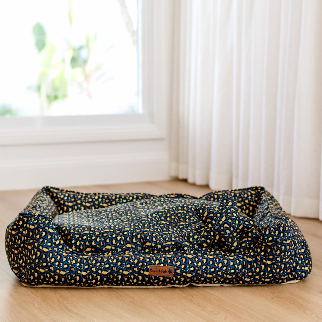 Midnight Leopard Snuggle Bud dog bed.