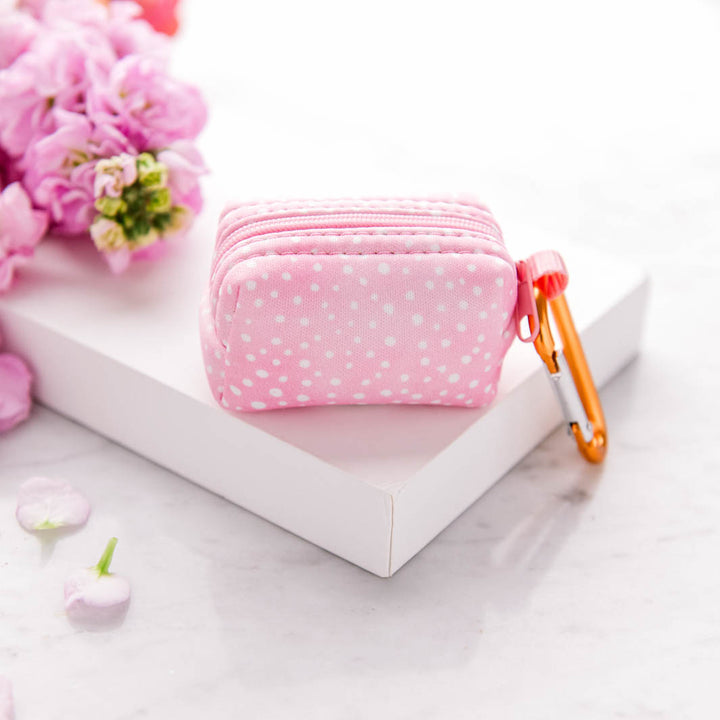 Underside of the Think Pretty Thoughts - Pink Dots deja poo waste bag holder.