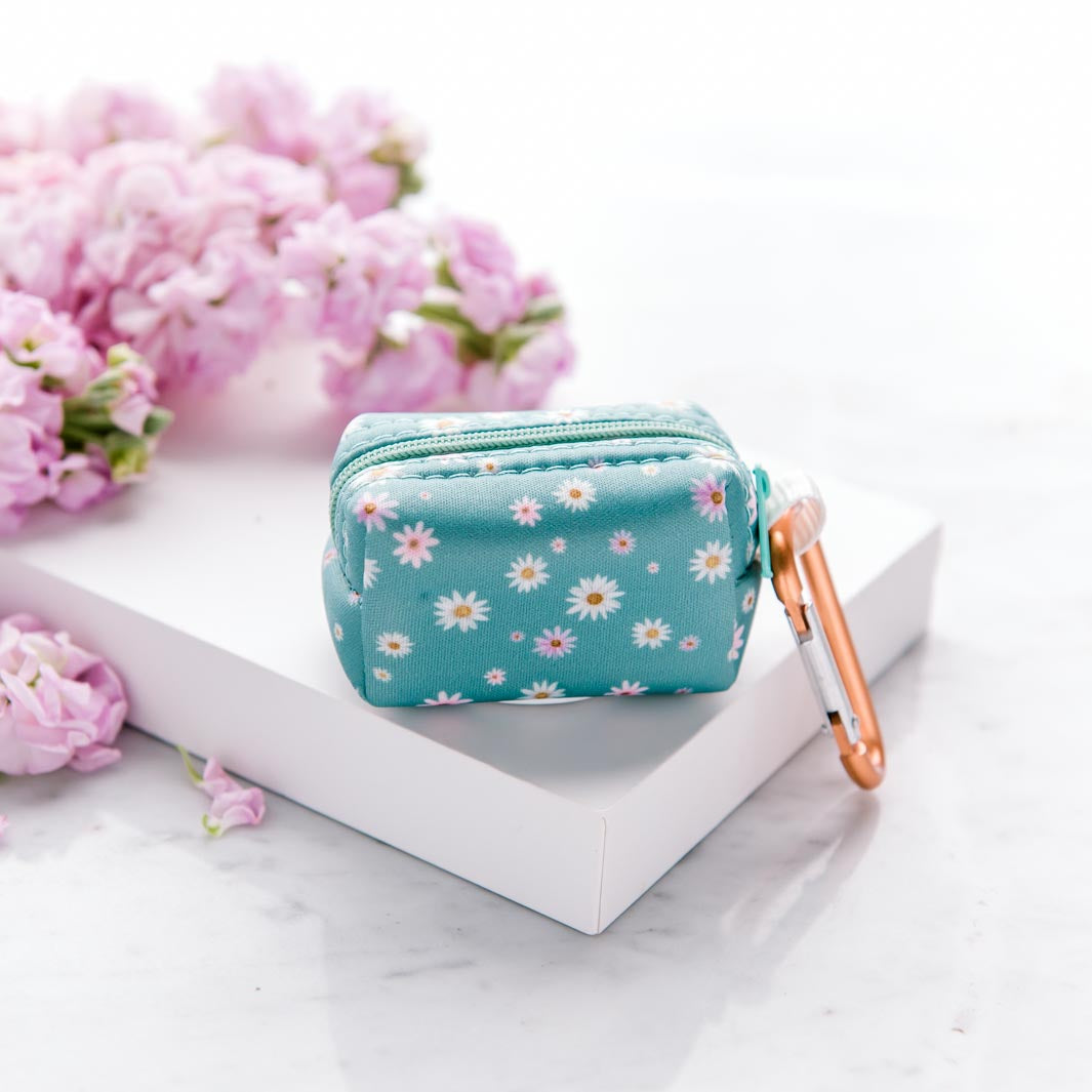 Underside of the Daisy Baby waste bag holder.