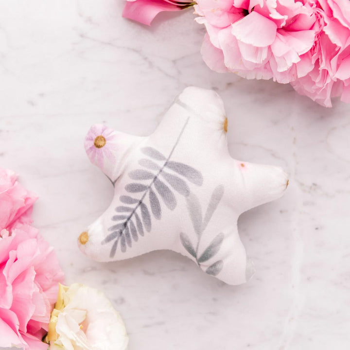 Free Daisy Baby - Wildflowers toy comes with each Cuddle Bud dog bed.