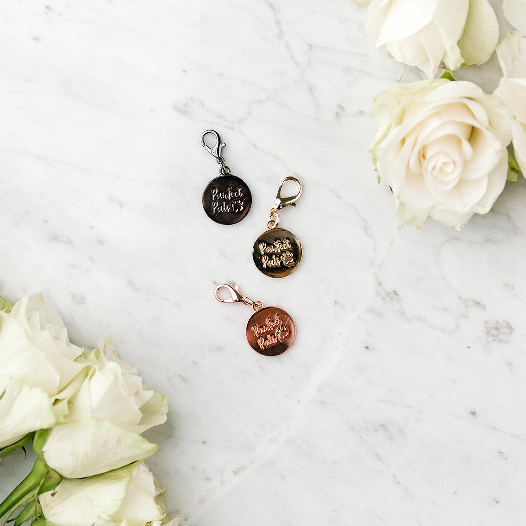 The front of our engraved dog tags, available in rose gold, gold and platinum.